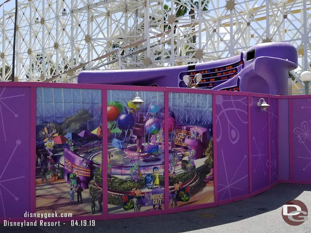 In the foreground the concept art for the attraction.