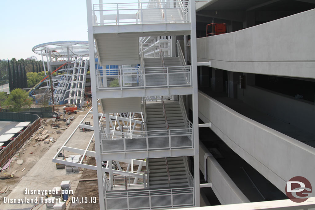 The near stair case looks done.  to the right the bridge to the Pixar Pals structure.