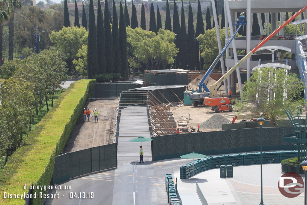 A better view of the temporary walkway on what will eventually be the tram way.  Notice the team on the left and that portion has been cleared already.