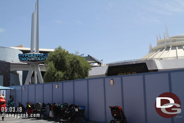 Walls are still up around the Tomorrowland Theater queue area.