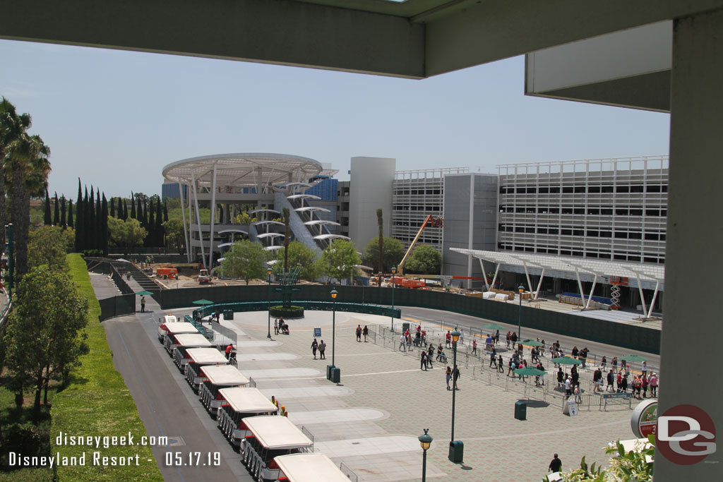 The Pixar Pals Parking Structure is racing along to get open in time to help with the Star Wars crowds.  Here is a look at the tram stop area.