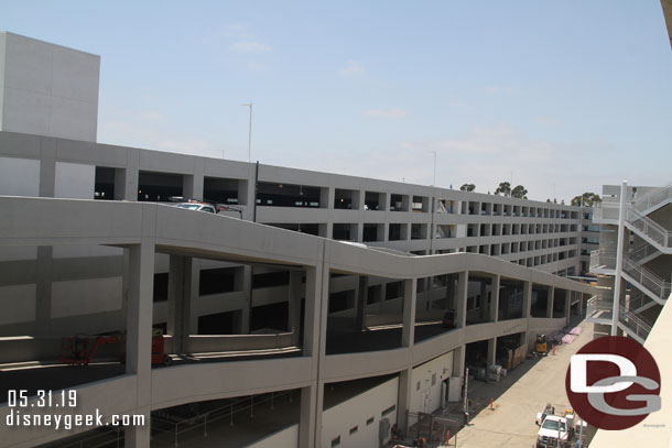 Lights are installed on the roof level and other elements are being added.