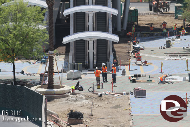 Pavers are installed around the escalators too.  And looks like seating around the tree.