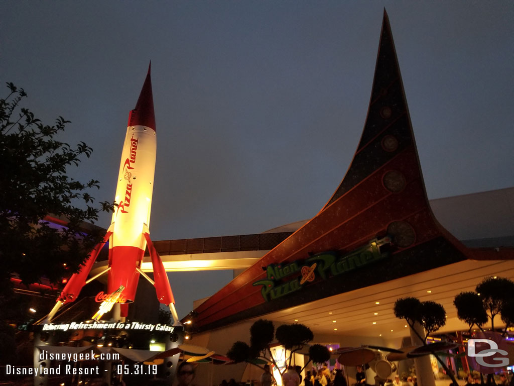 No lights on the Pizza Planet sign yet.