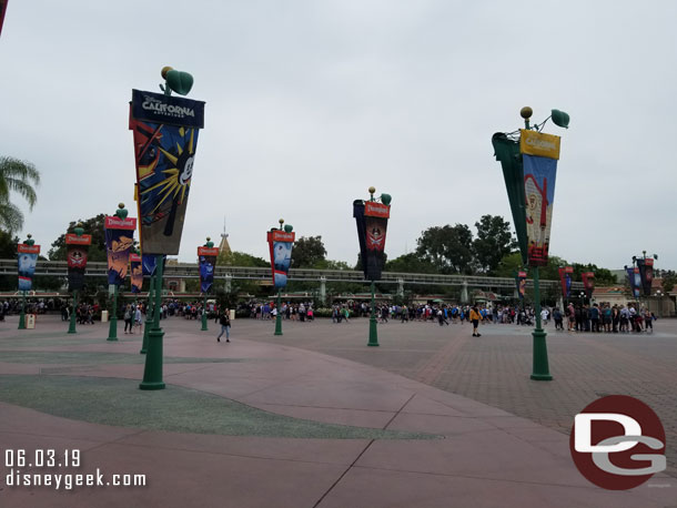 Disneyland queue extends past the Monorail.