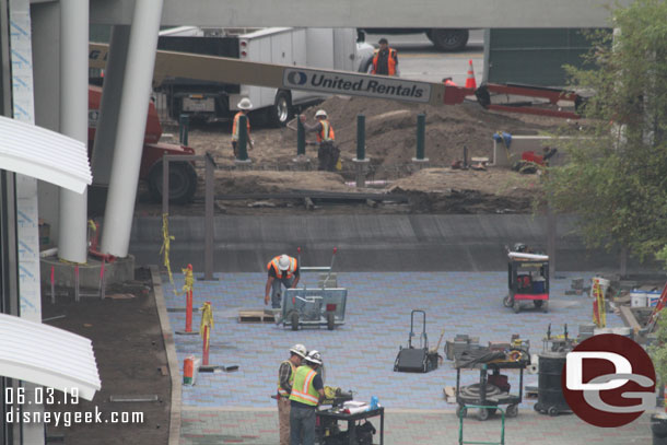 A closer look at the far side.  Pavers go to the tram route and a fence is taking shape along the tram route and along Magic Way.