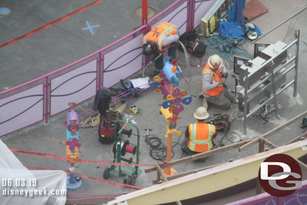 Another team working on what appears to be some wiring.