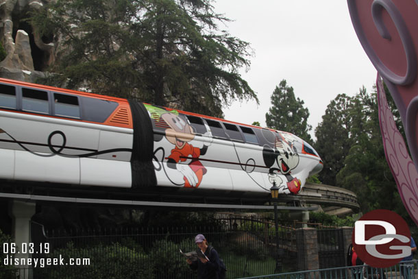 Monorail Orange cruising overhead as I waited.