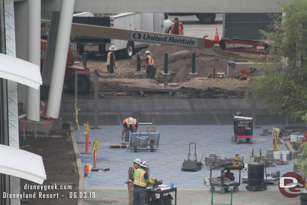 A closer look at the far side.  Pavers go to the tram route and a fence is taking shape along the tram route and along Magic Way.