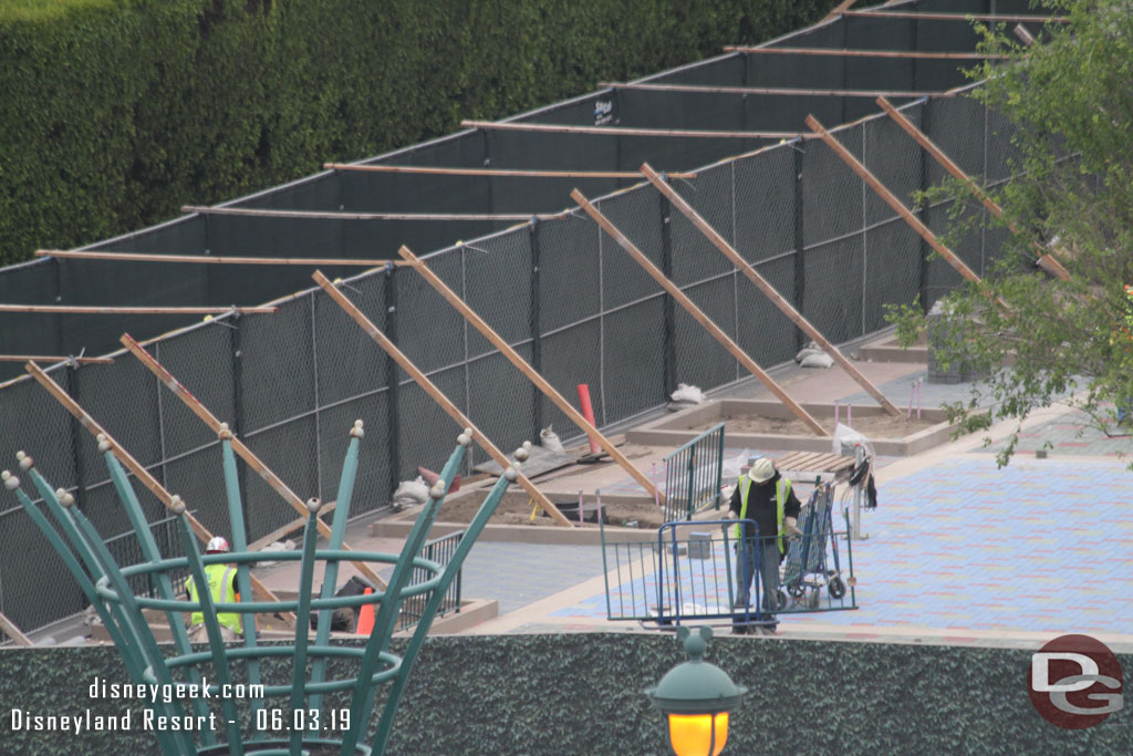 A crew was working on fencing at the new tram drop off zone.