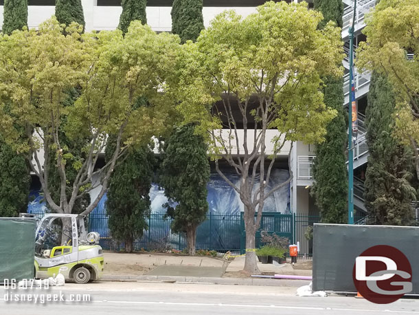 Looking across the street you can see the fence for the structure has been painted and more landscaping is going in.