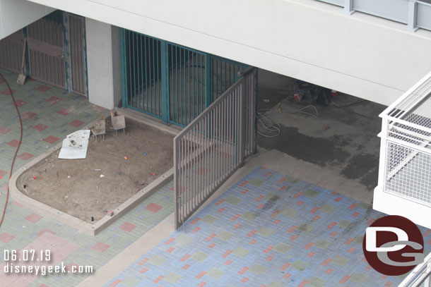 Gates are installed now and preparations for more fences around the planter on the left (notice the holes cut in the concrete).