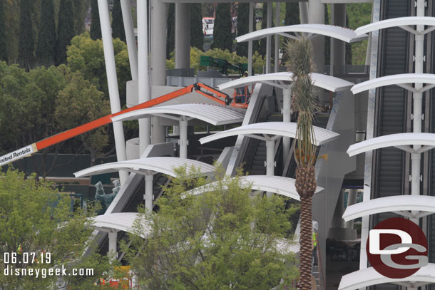 Installing the side panels on the escalators.