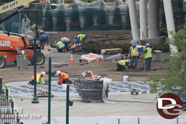 The last section of pavers near the unload area is being worked on and landscaping work is starting on the area between the tram way and unload.  Also notice the light light poles are in with speakers which is new for the tram stop.