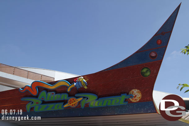 The Alien Pizza Planet sign looks to be fully installed now.