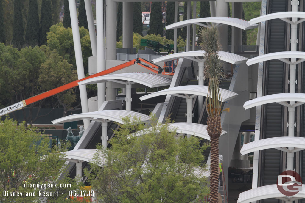 Installing the side panels on the escalators.