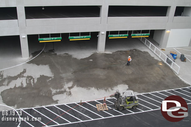 This morning they were cleaning the pavement near the entrance to the lower level.