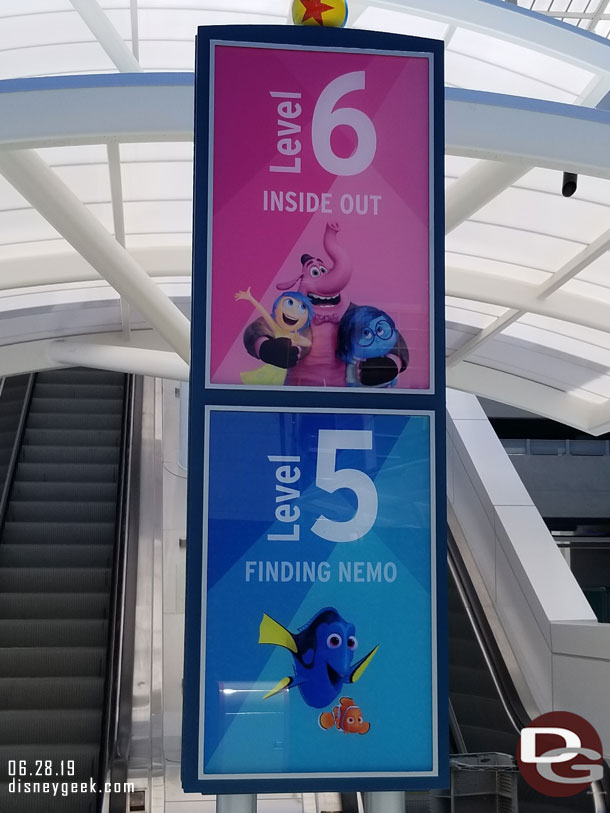 A closer look at the signs for the levels.  Notice the colors match Mickey and Friends level colors.