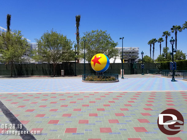 The Pixar Ball is in a planter in the center.  Guessing a similar sculpture matching the signage will go near Mickey and Friends.