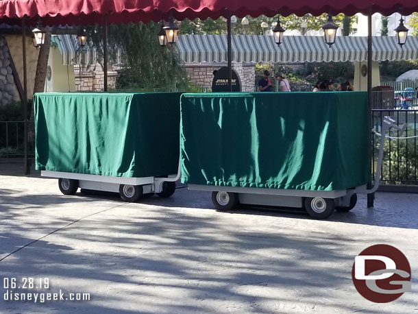 Carts positioned near the Matterhorn/Small World FastPass area for Galaxy's Edge Boarding Pass distribution, but not needed today.