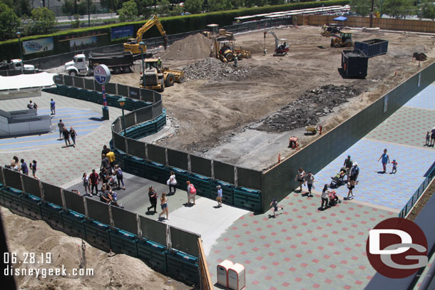 A temporary walkway from the escalators through the work site to the new security area and tram stops.