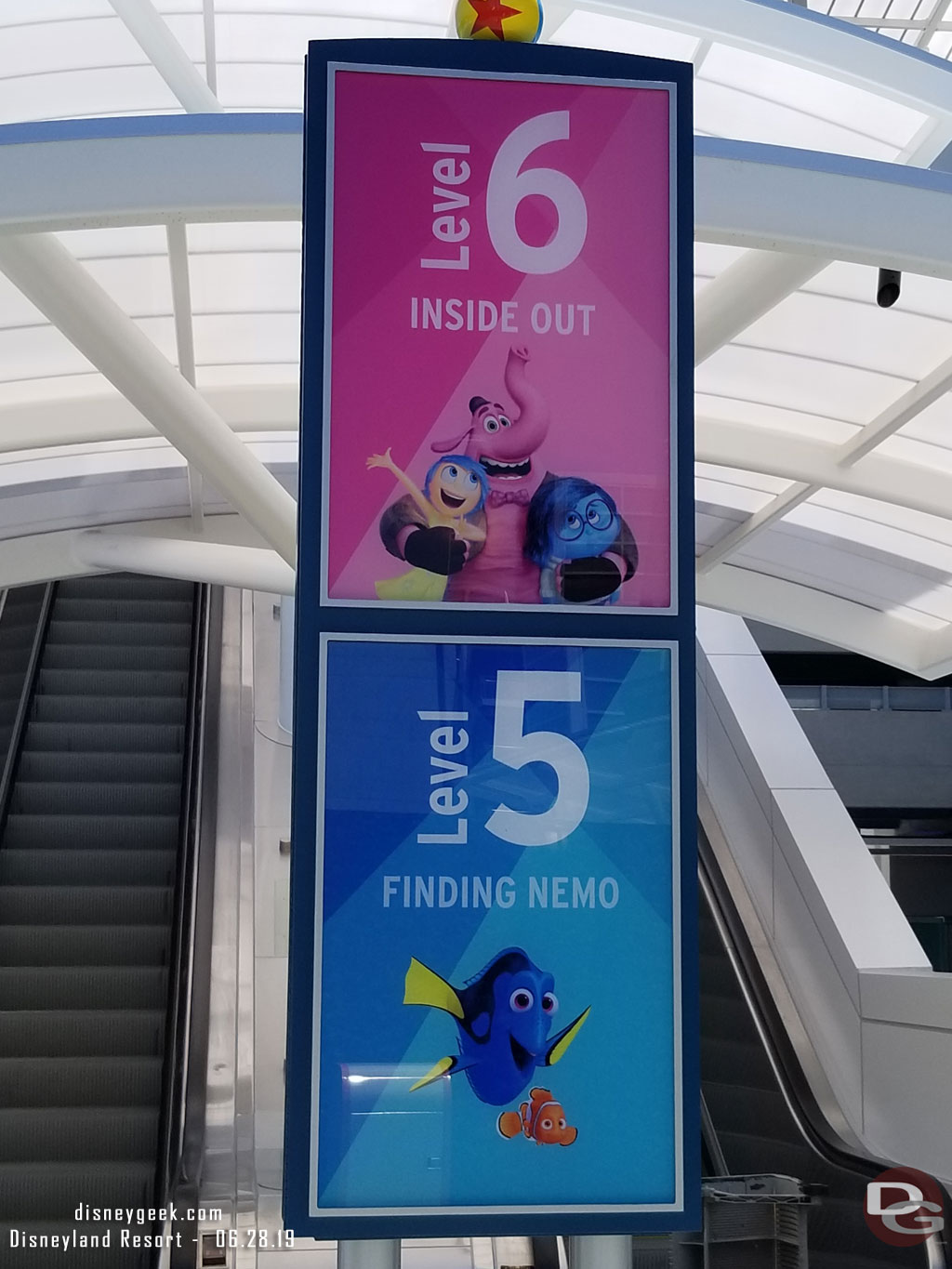 A closer look at the signs for the levels.  Notice the colors match Mickey and Friends level colors.