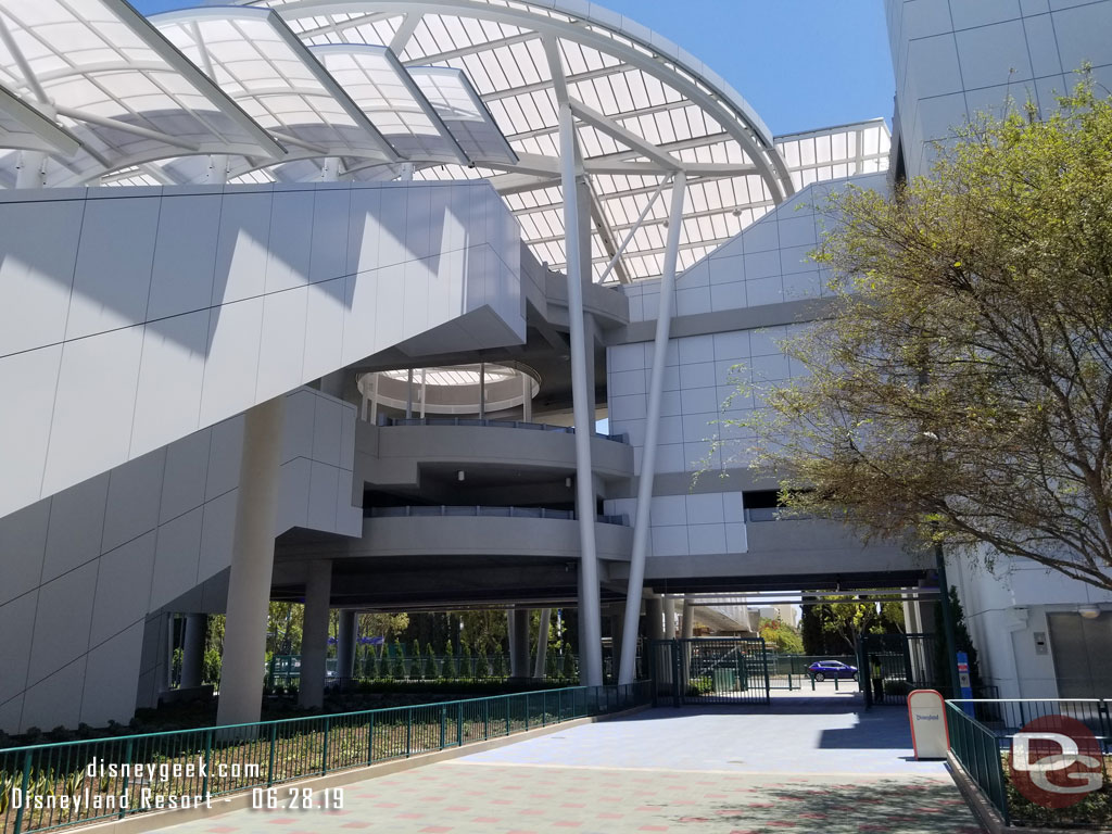 The current walkway to reach Downtown Disney.  By September a bridge will used instead, until then you have to cross the tram route then turn left to the light to cross.