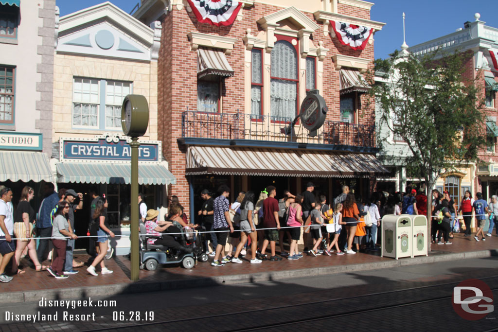 No one waiting for the parade yet on the sunny side of the street.  Traffic was congested on the walkway portion.