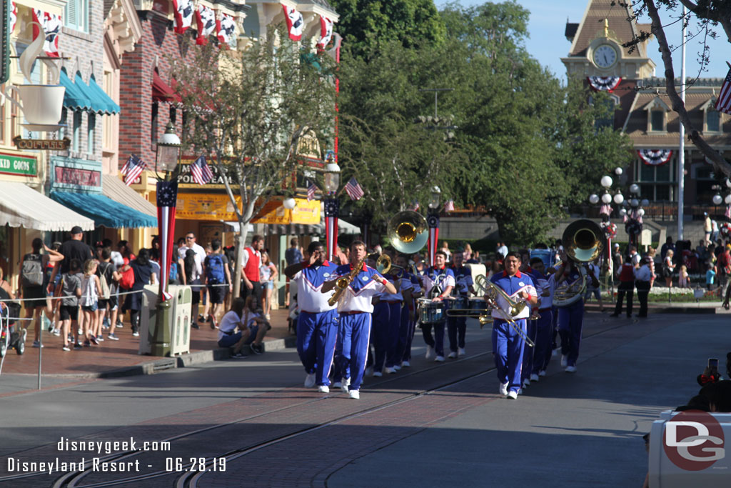 The 2019 Disneyland Resort All-American College Band making its way up Main Street USA