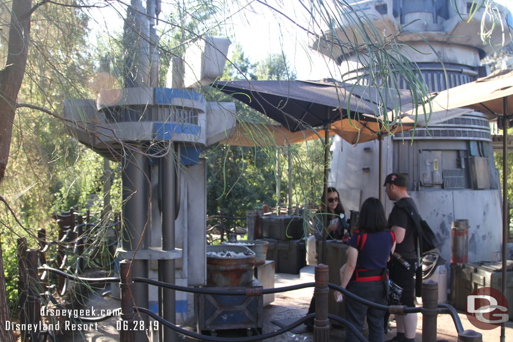 The beverage stop has shifted in the forest since my last visit. It is now at the Rise of the Resistance entrance.