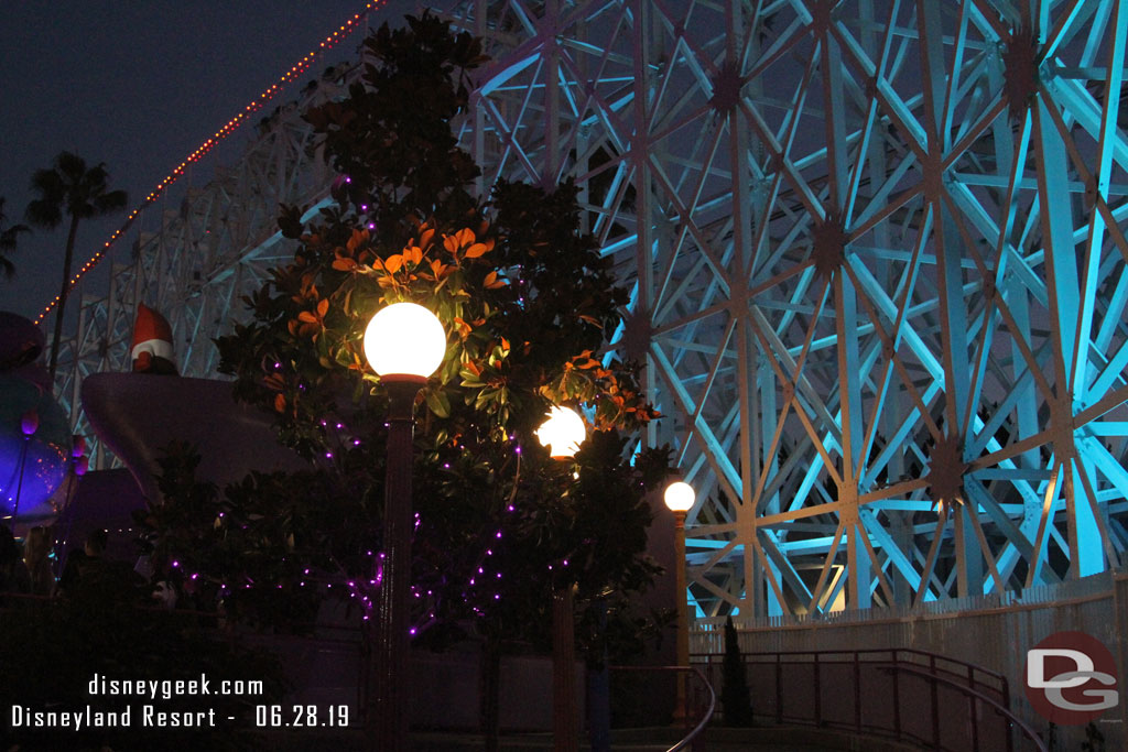 Some lights on the trees by the exit ramp.