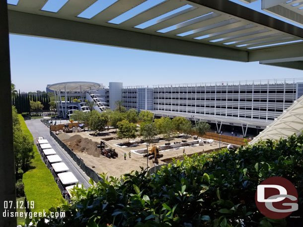 Trees are being installed in the parking structure tram plaza.  