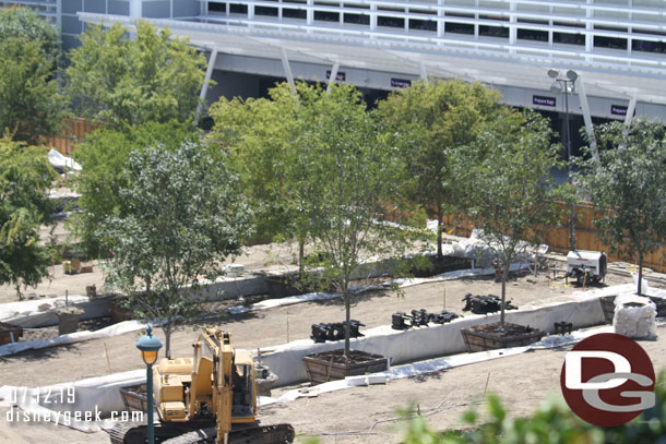 They have dug large trenches and placed the trees into them.