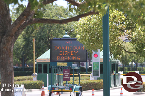 Downtown Disney lot is blocked off and has signs saying no parking.