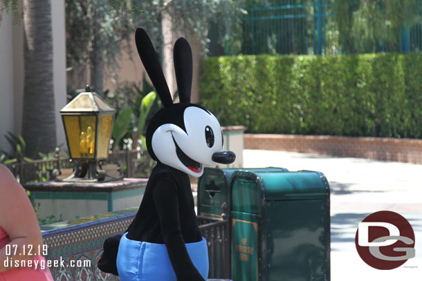 Upon entering Disney California Adventure spotted Oswald off to the right meeting guests.