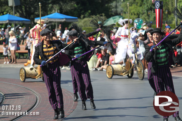 Chimney Sweeps leading the way for Mary Poppins and Bert.