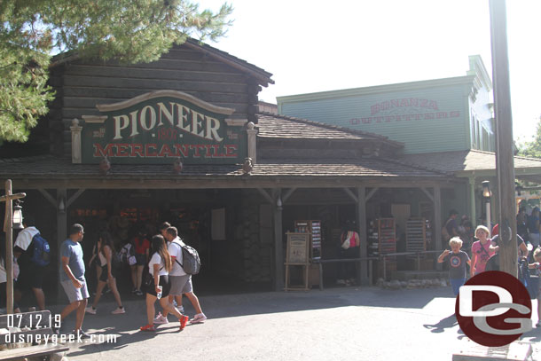A poster has recently been added to the side of the Bonanza Outfitters facing Pioneer Mercantile off to the right in this picture.