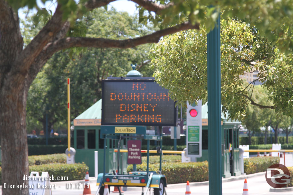 Downtown Disney lot is blocked off and has signs saying no parking.