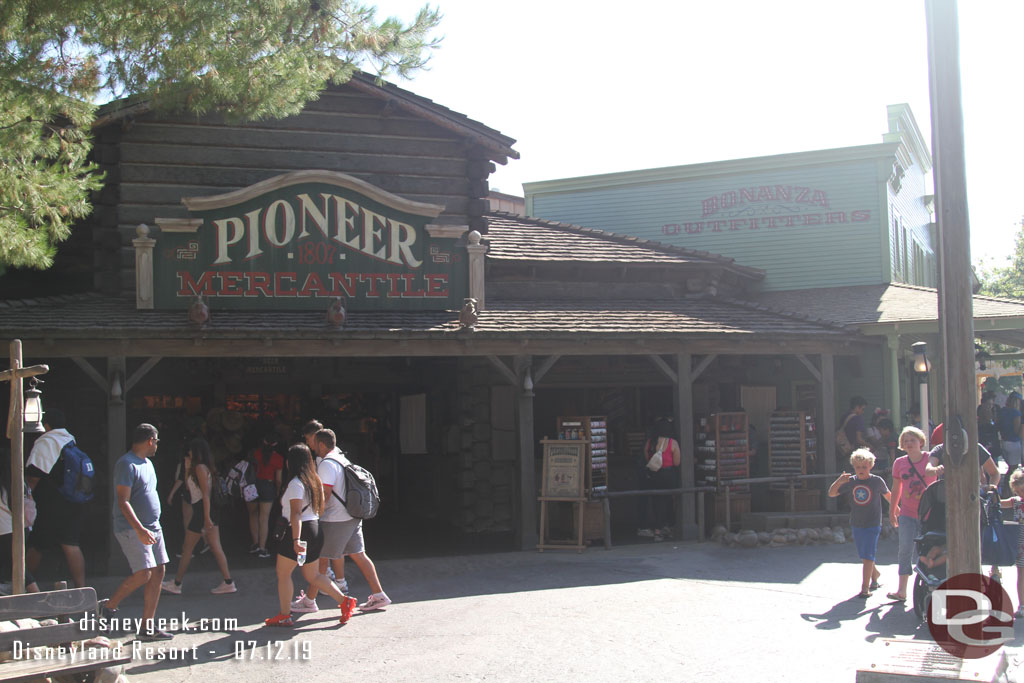 A poster has recently been added to the side of the Bonanza Outfitters facing Pioneer Mercantile off to the right in this picture.