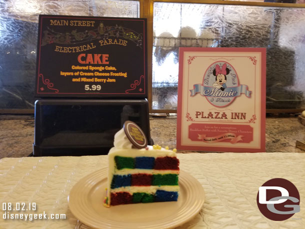 Plaza Inn has a special cake for the return of the Main Street Electrical Parade.