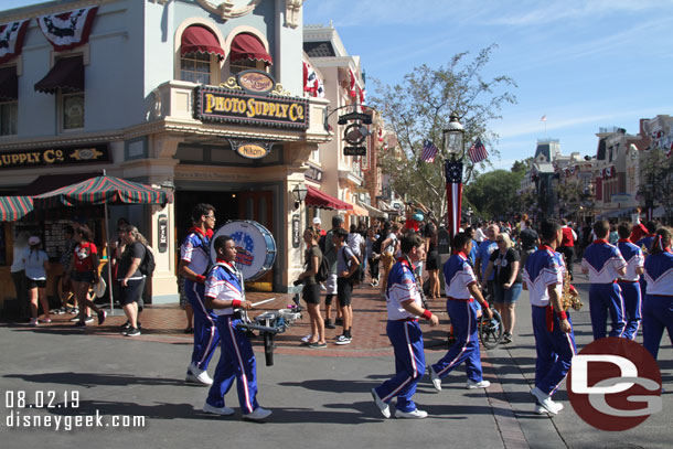 The 2019 All-American College Band heading toward Town Square for the nightly Flag Retreat.