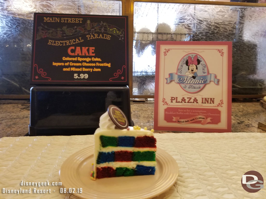 Plaza Inn has a special cake for the return of the Main Street Electrical Parade.