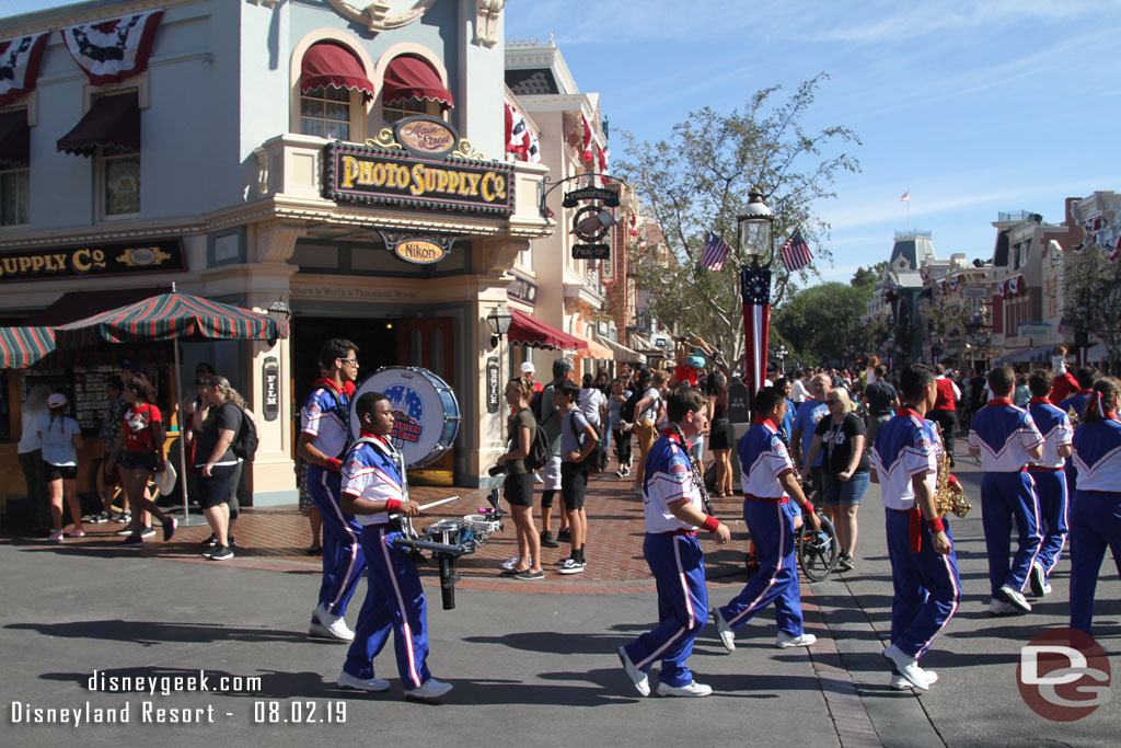 The 2019 All-American College Band heading toward Town Square for the nightly Flag Retreat.