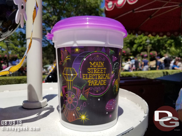 Main Street Electrical Parade popcorn buckets with refill options.