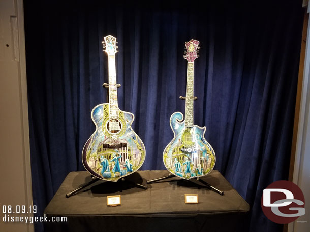 Inside the vault two guitars.  The one on the left was $33,000 and the one on the right $13,000.