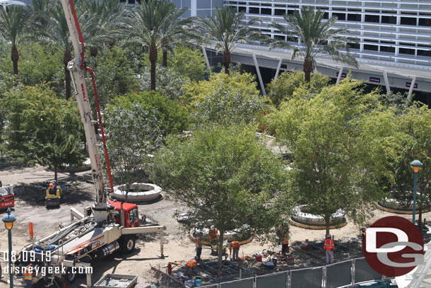 Today teams were working on the curbs for the planters around the trees.