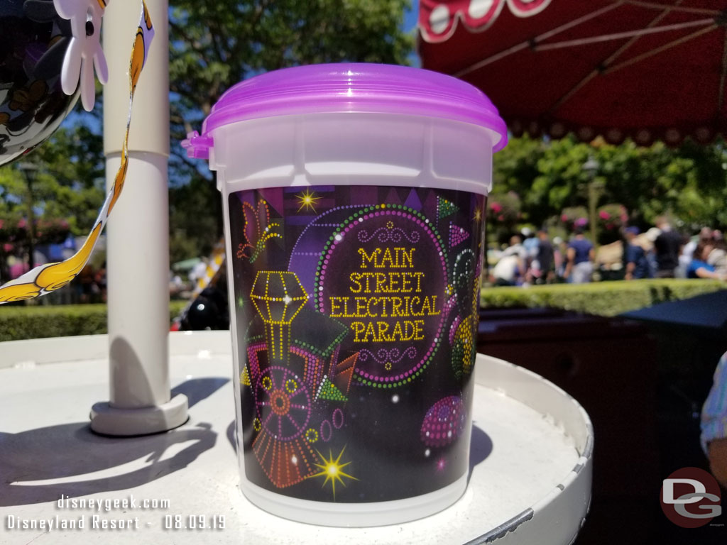 Main Street Electrical Parade popcorn buckets with refill options.