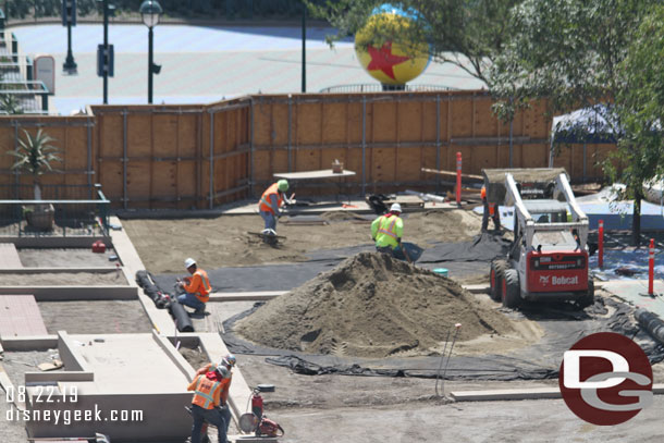 Sand waiting to be spread out and compacted for the pavers.