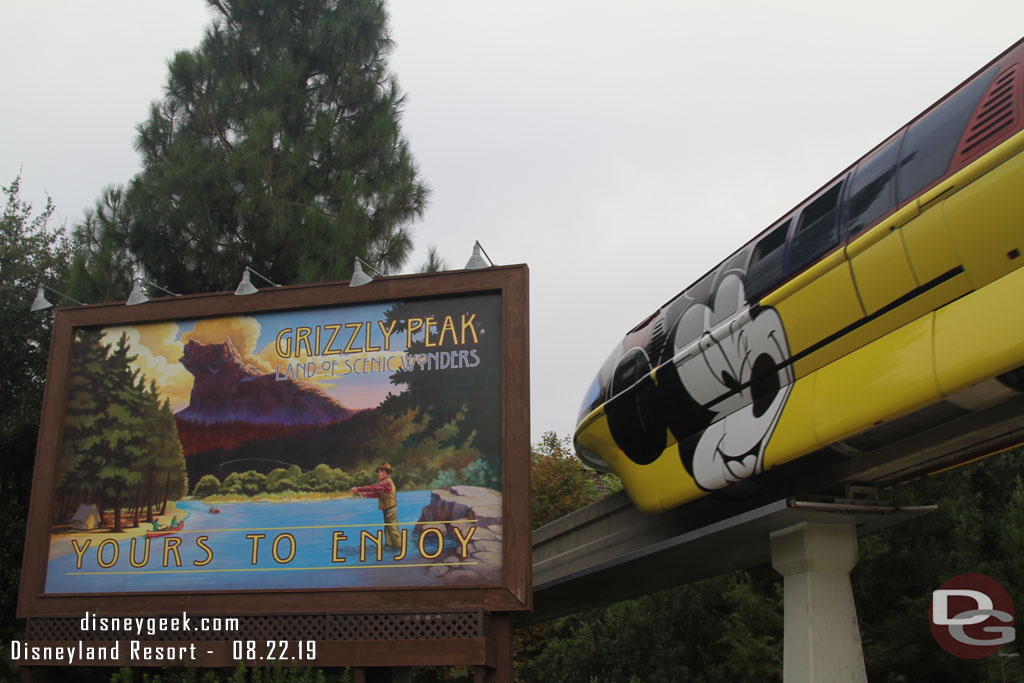 A monorail passing overhead.  Still featuring the Get Your Ears on wrap.