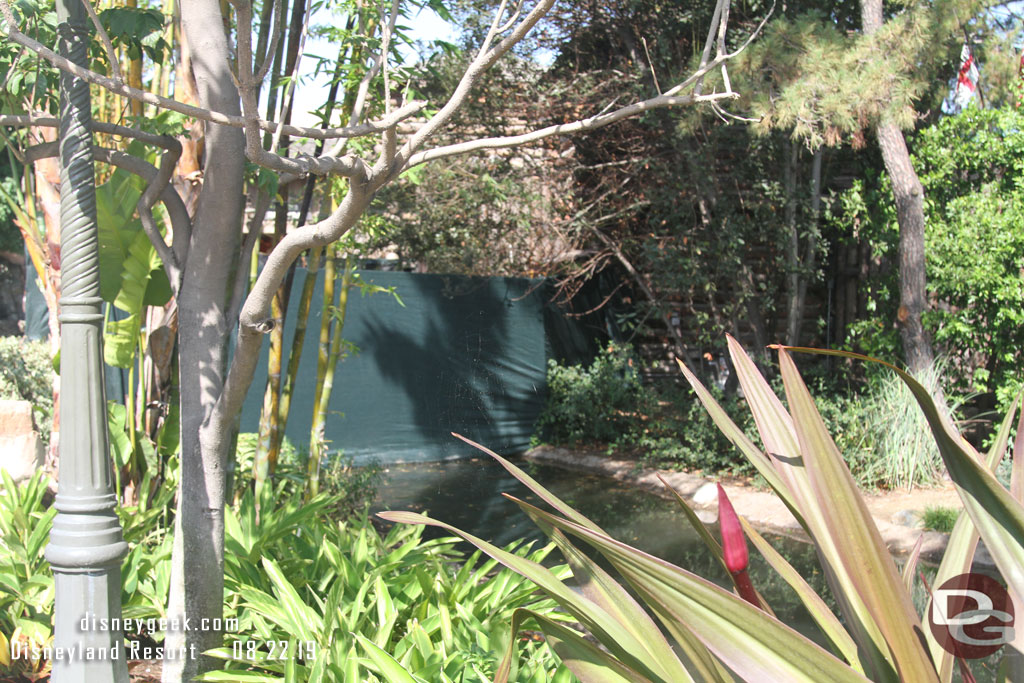 Fencing up around some of the area near the Adventureland bridge.